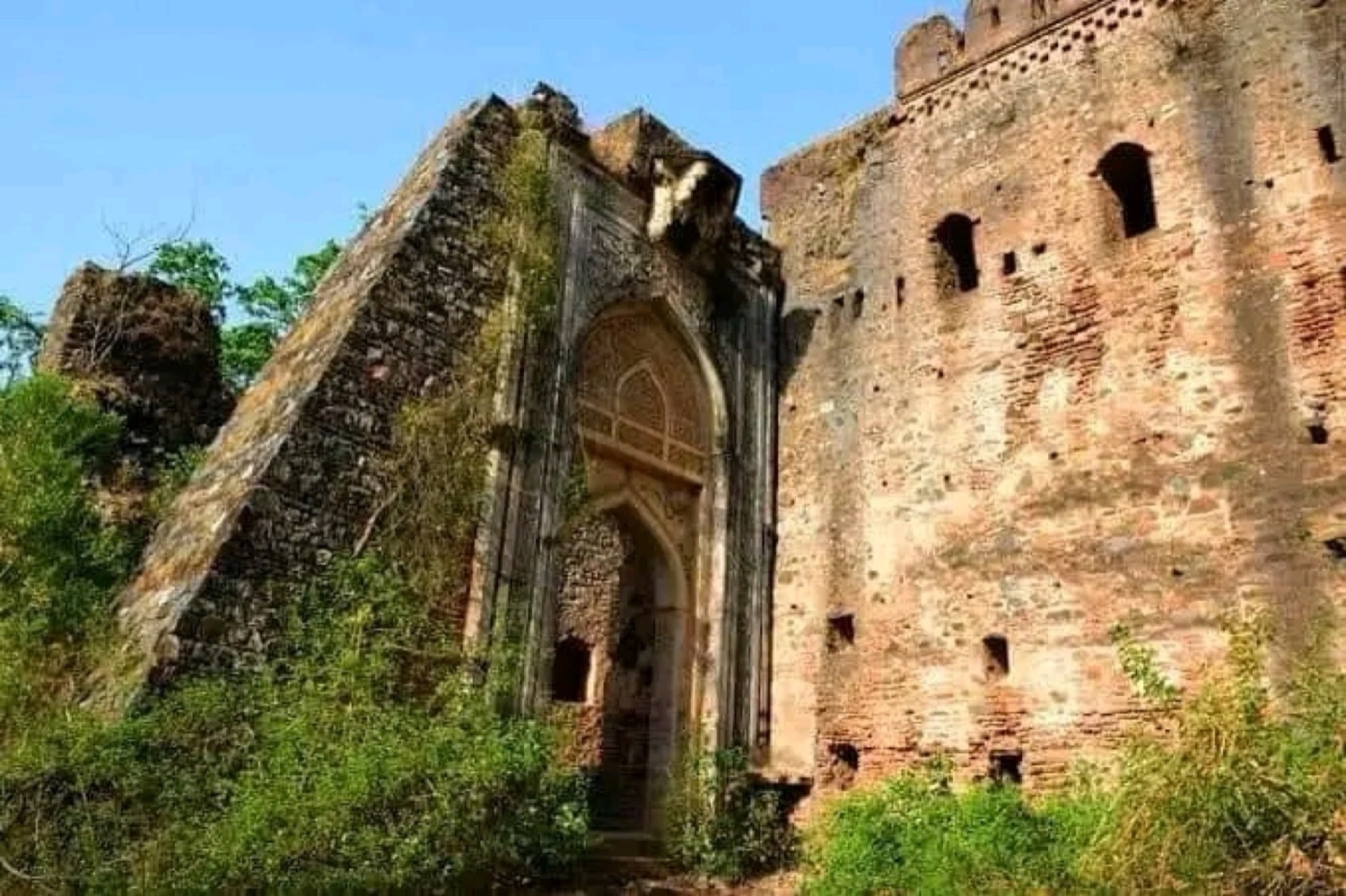 The high ruined brick walls of Jalalgarh Fort near Purnia