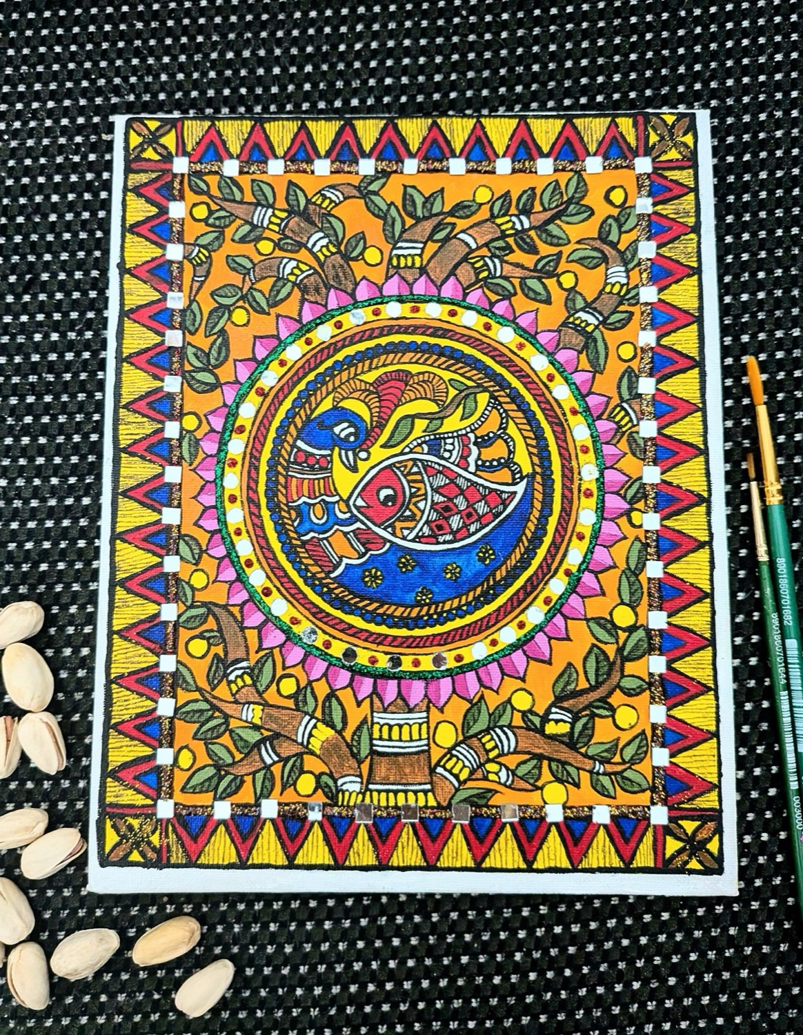 A vividly coloured Madhubani (Mithila) painting with bold double-outlined figures