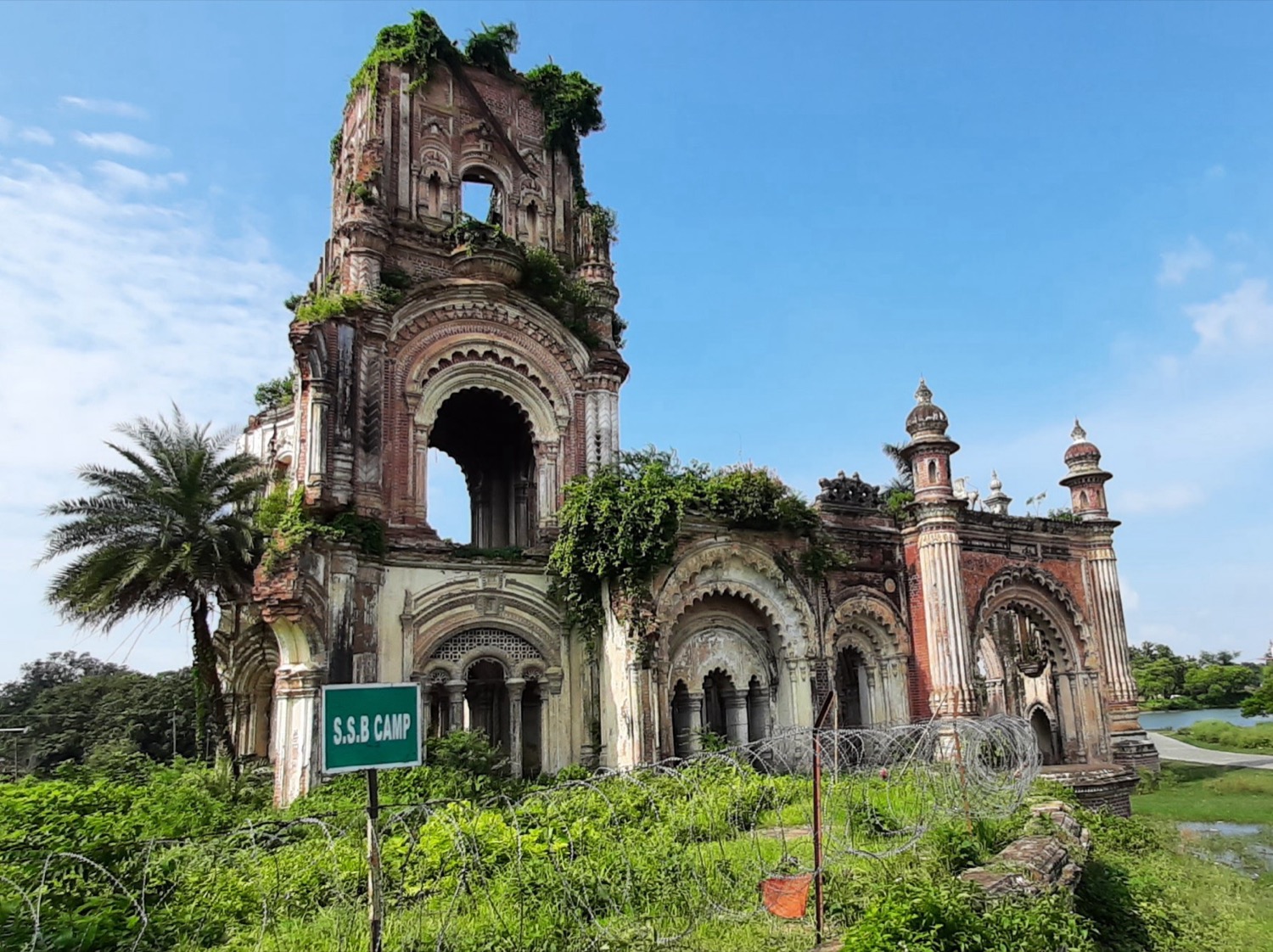 The earthquake-ruined grand facade of Navlakha Palace at Rajnagar